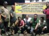 Warg Barayya Pasang Spanduk Terima Kasih Untuk Polisi